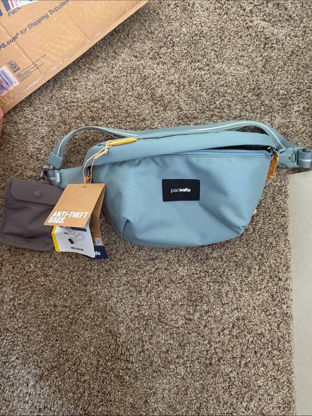 Pacsafe Teal Blue Anti-Theft Crossbody Bag with Yellow Accents